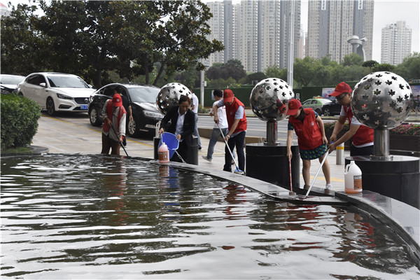 yl23455永利集团官网联合商务区社区开展“清洁家园 美化社区”       主题志愿服务活动